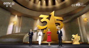 4 hosts from CCTV TV station standing in front of the large LED volume powered with Pixotope XR graphics 