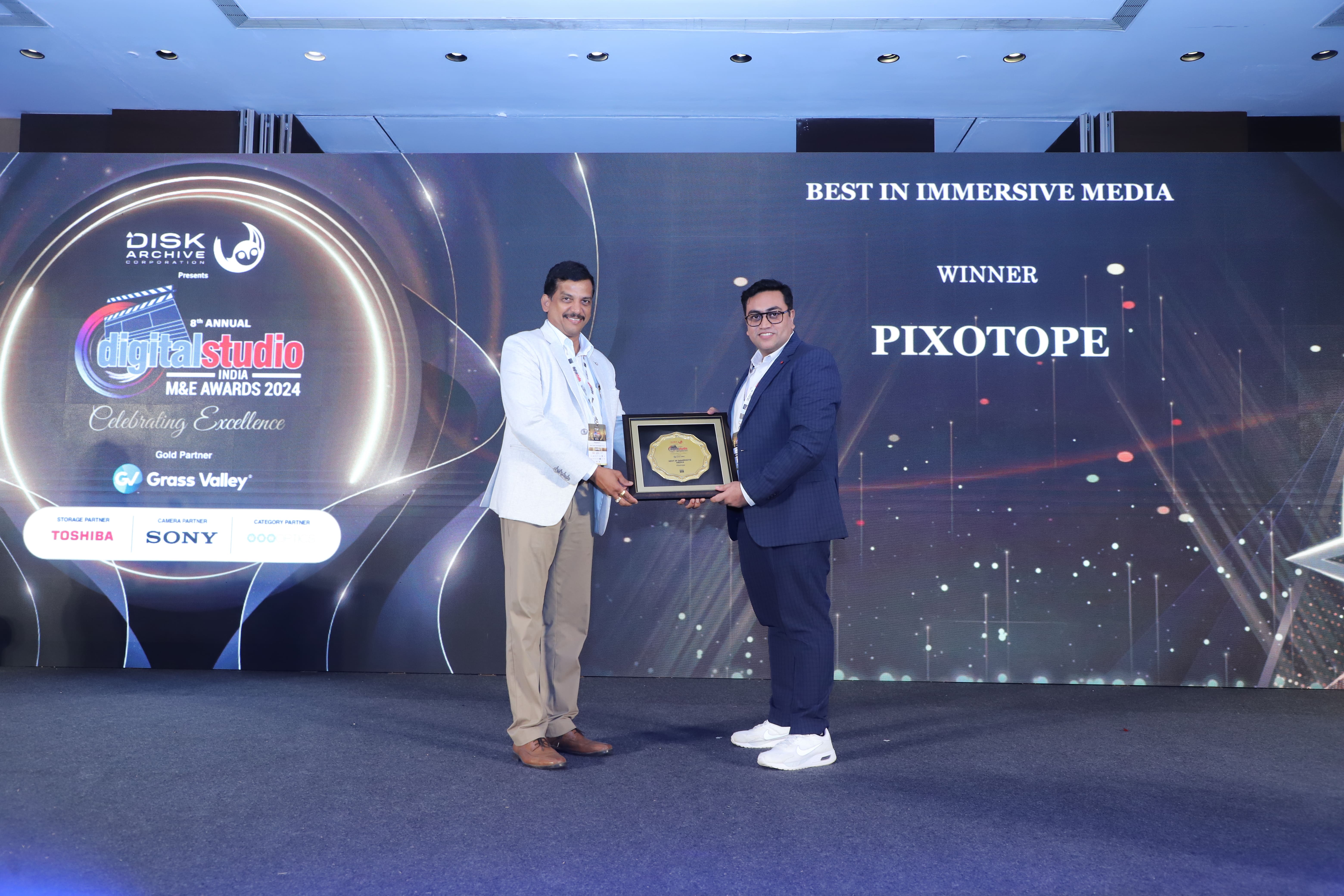 Pixotope Sales Director for SAARC region receiving award for Best in Immersive Media on behalf of Pixotope